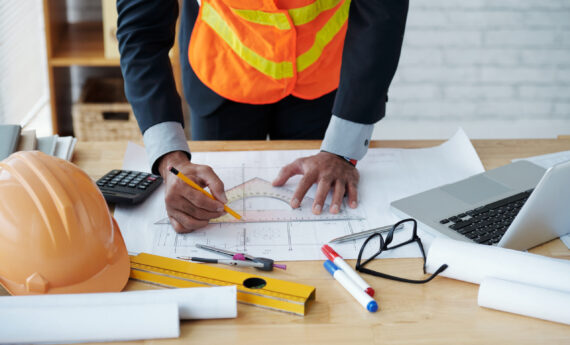 Cropped image of engineer drawing construction plan
